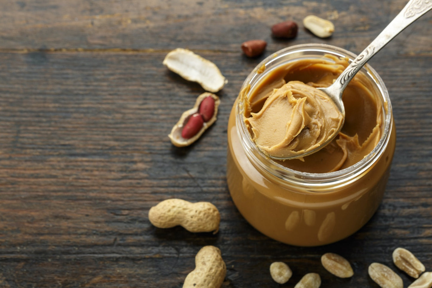 Glass jar of heirloom peanut butter handcrafted in Chiapas, Mexico – slow-made, non-GMO, sustainable, beyond organic